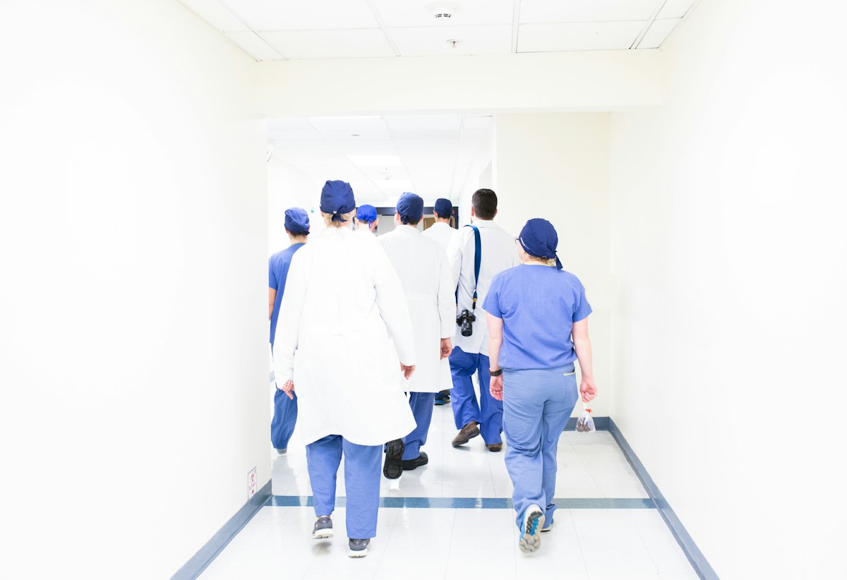 Hospital clinicians walking together